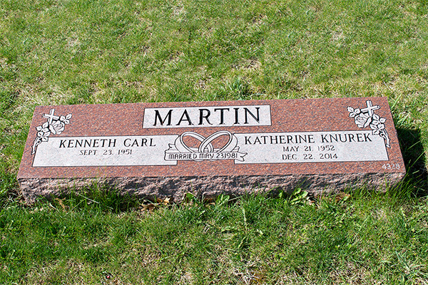 4 foot red raised headstone